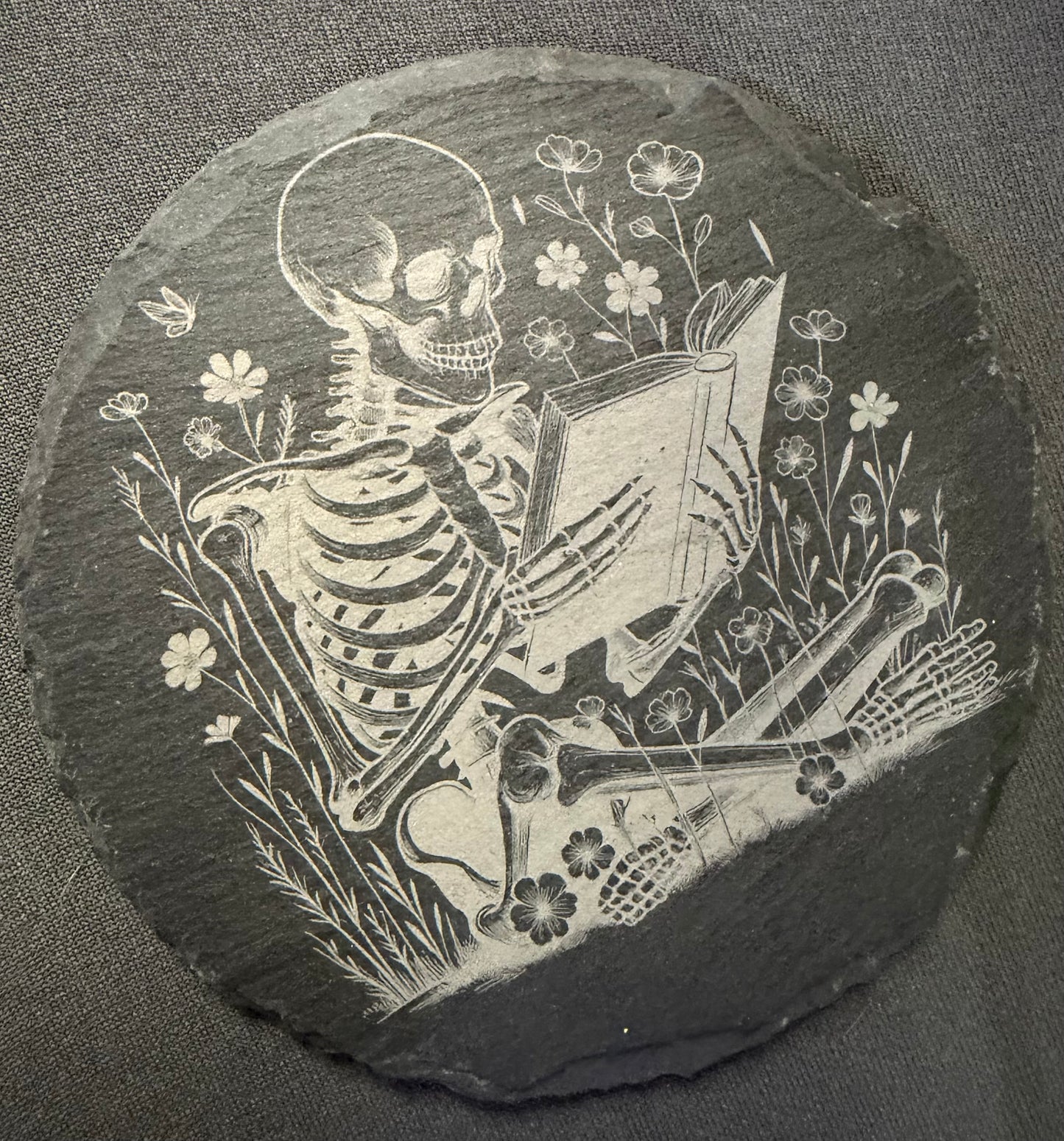 Skeleton reading a book
